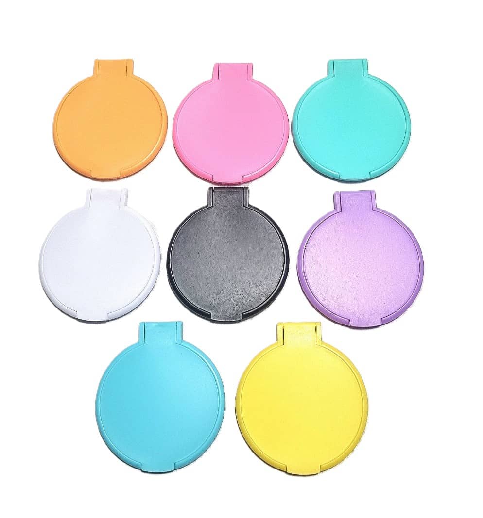 Miroir rond à clapet. Couleur aléatoire